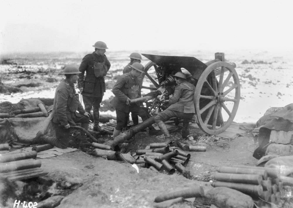New Zealand artillerymen firing their gun in the Butte, Belgium. 1 January 1918.